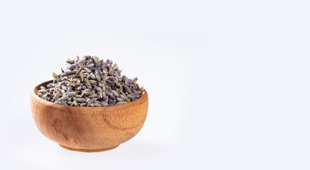Lavandula - Dried lavender flowers in the wooden bowl