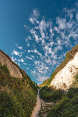 Empty Kingsgate Beach, walking through the chalk stacks clifs at Botany Bay in Kent, England.