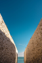 Empty Kingsgate Beach, walking through the chalk stacks clifs at Botany Bay in Kent, England.