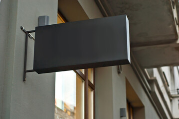 Rectangular sign on the building. Copy space and space for text. Mockup for design. Blank template...