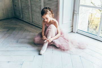 Young ballet dancer in dance class