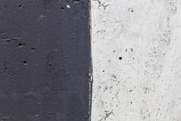 Old Weathered Half  Black Half White Painted Concrete Texture	