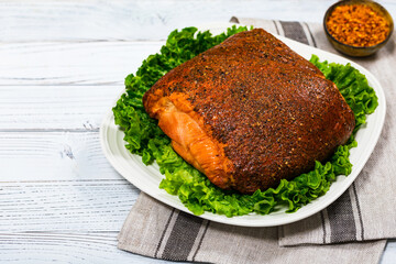 Roasted Turkey Breast Cajun Style Deli Lunch Meat on Old Wooden Background. Selective focus.