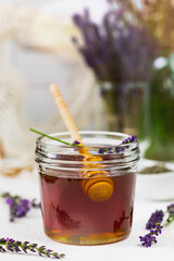 Lavender Herbal Honey with Lavender Flowers. Selective focus.