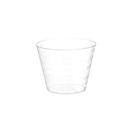 a glass for taking medicines on a white isolated background in a light key