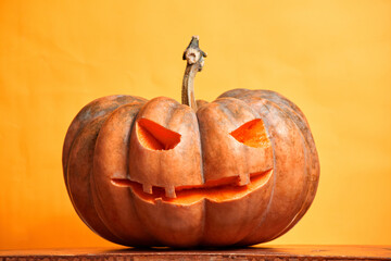 halloween pumpkins on orange background copy space