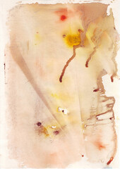 Watercolor stains, blots and drips on white paper. Various shades of brown, red, yellow.