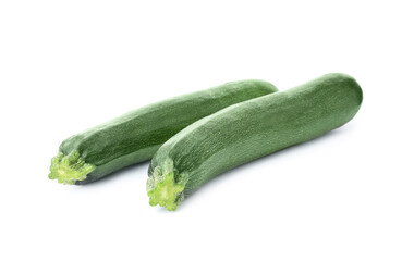 Raw green ripe zucchinis isolated on white