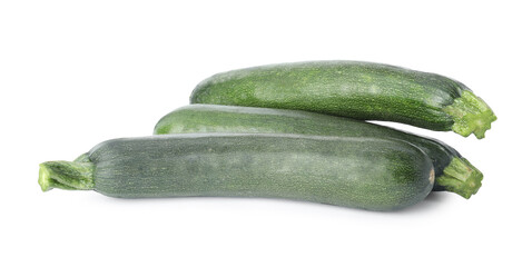 Raw green ripe zucchinis isolated on white