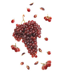 Fresh ripe grapes falling on white background