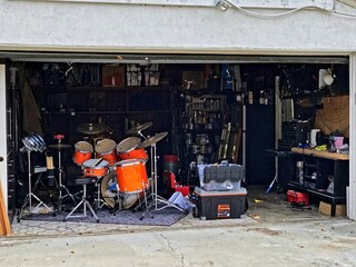 Red color drums in the garage sale