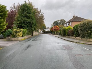 Looking up, Bradford Old Road, on a wet day in late summer in, Cottingley, Bradford, UK