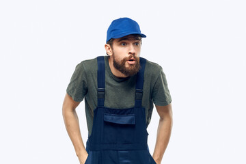 Worker man uniform delivery service emotions studio light background