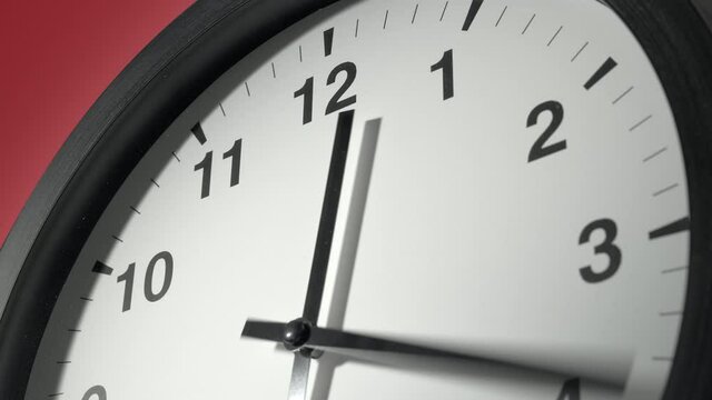 Clock Face in Time Lapse on Red Burgundy Cherry Wall in Office