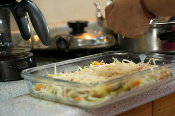Chef making vegetarian lasagna
