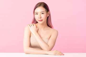 Obraz na płótnie Canvas Beautiful young asian woman with clean fresh skin on pink background, Face care, Facial treatment, Cosmetology, beauty and spa, Asian women portrait