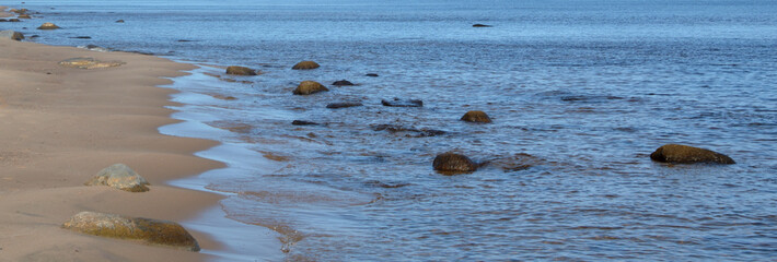 Water view with granite stones.