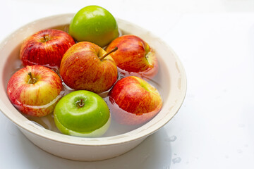 Washing fresh apples in the water