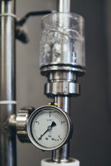 close up of a beer brewing machine valve