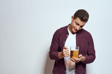 Man with a mug of beer fun alcohol lifestyle shirt light background