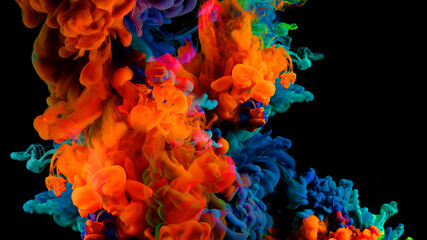 Color drops in water , abstract color mix , drop of Ink color mix paint falling on water Colorful...