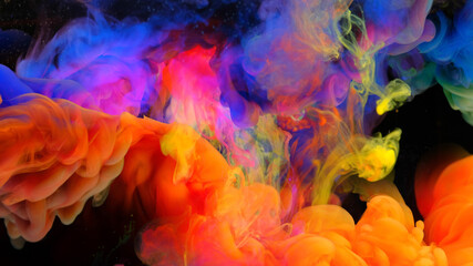 Color drops in water , abstract color mix , drop of Ink color mix paint falling on water Colorful ink in water,
