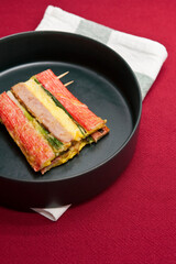 Korean food, korean pancake (Sanjeok) on red background.