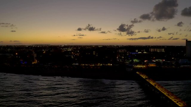 Deerfield Florida night footage 4k 60p lateral over ocean