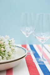 Table settings with white flowers.