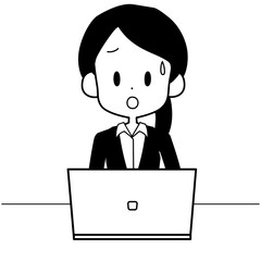 困った表情でノートパソコンを操作するビジネスウーマン