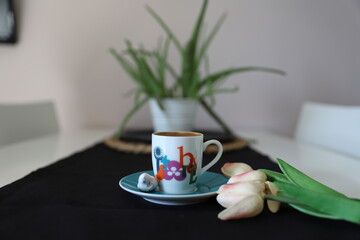 Turkish coffee wit black background and tulips