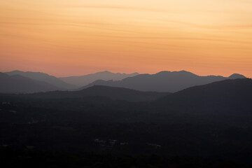 Layers of mountains at sunset