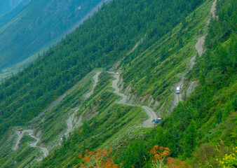 Steep descent of the Katu Yaryk pass in the mountains of Altai