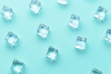 Ice cubes on color background