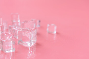 Ice cubes on color background
