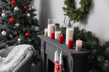 Decorated fireplace in interior of room on Christmas eve