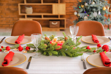 Beautiful table setting with Christmas decor in living room