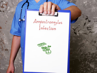 Angiostrongylus Infection inscription on the piece of paper.
