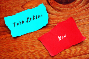 Financial concept about Take Action Now with phrase on the sheet.
