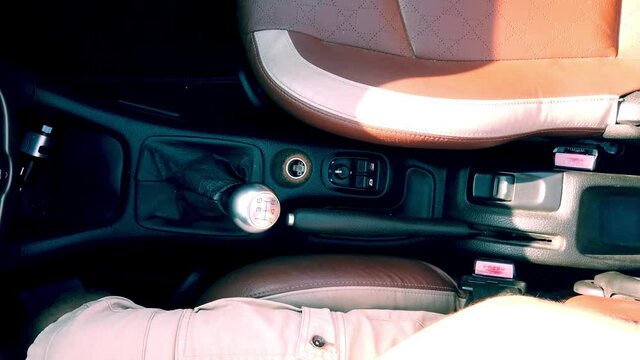Hand on speed car gear shift nob