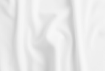 Blurred white abstract wavy clothes background.