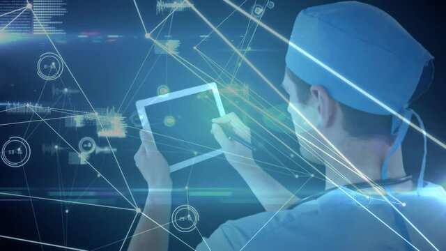 Network of connections and data processing against rear view of male surgeon using digital tablet ag - Powered by Adobe