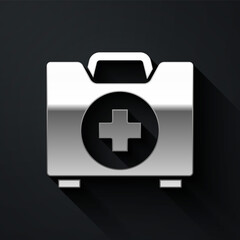 Fototapeta premium Silver First aid kit icon isolated on black background. Medical box with cross. Medical equipment for emergency. Healthcare concept. Long shadow style. Vector Illustration.