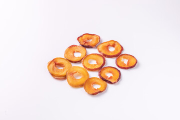slices of dried plum on a white background. dried fruits. eco.top view.
