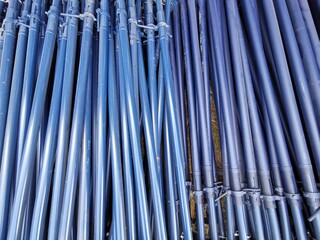 Blue steel scaffolding pipe for construction line pattern background. 