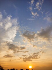 Obraz premium sunset over the field