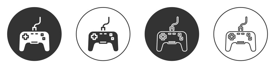 Black Gamepad icon isolated on white background. Game controller. Circle button. Vector. © Kostiantyn