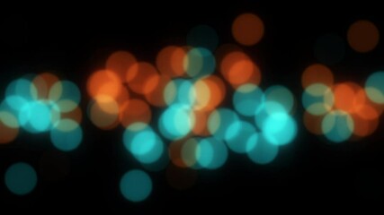 Looping Teal and Orange Bokeh Balls - Illustration Animation.  Out of Focus Points of Light slowly drift through the frame.  Seamless Loop.
