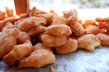 Odading is a fried cake with sesame seeds on the outside. This food is from West Java, Indonesia.