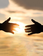 Giving a helping hand. Rescue, helping gesture or hands. The outstretched hands, salvation, help...